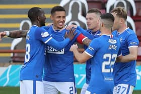 Rangers' James Tavernier (centre left) celebrates with his team-mates after scoring his side's second goal of the game from the penalty spot during the Scottish Premiership match at Fir Park, Motherwell