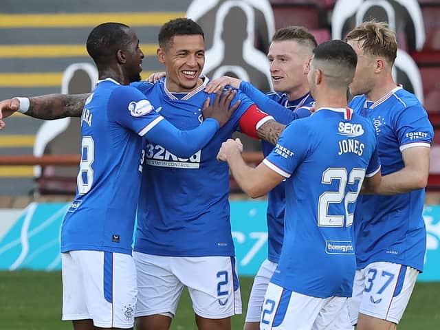 Rangers' James Tavernier (centre left) celebrates with his team-mates after scoring his side's second goal of the game from the penalty spot during the Scottish Premiership match at Fir Park, Motherwell