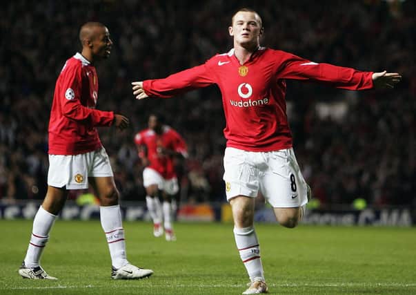 Wayne Rooney of Manchester United celebrates his second goal during the UEFA Champions League Group D match between Manchester United and Fenerbahce SK at Old Trafford on September 28, 2004 in Manchester, England.  (Photo by Laurence Griffiths/Getty Images)