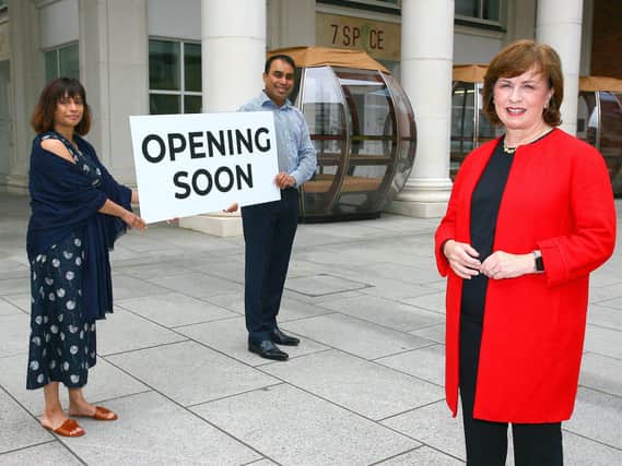 Luthfur Ahmed and wife Fably Khanam show Economy and Tourism Minister, Diane Dodds, purpose-build pods at 7Spice, a new Bangladeshi restaurant due to open in Belfast’s St Anne’s Square shortly
