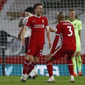 Liverpool's Diogo Jota celebrates scoring his side's third goal of the game during the Premier League match at Anfield, Liverpool.