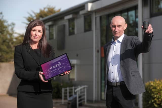 At the launch of Bluezone Technologies’ ‘no touch’ Legionella management system are Jacqueline McNamee, Director of Client Services and Pat McDonald, Technical Director displaying the Bluezone24 IoT platform and sensor at Bluezone Tech