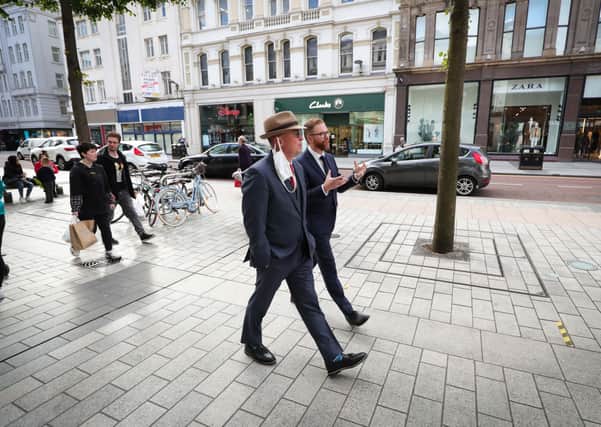 US Special Envoy Mick Mulvaney, wearing the hat, is shown round Belfast city centre on Tuesday by Belfast Chamber chief executive Simon Hamilton.
 
Also yesterday, he met the Ulster Unionist Party. 
Photo by Kelvin Boyes/Press Eye