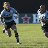 Jonah Lomu (R) and Andrew Powell of Cardiff in action during the Heineken European Cup match between Calvisano and Cardiff Blues at the Centro Sportivo San Michele Ground on December 10, 2005 in Calvisano, Italy. (Photo by Giuseppe Cacace/Getty Images).