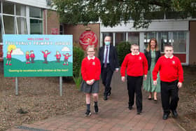 At Tullygally Primary School in Craigavon, Peter Weir met with pupils, Conor and Matthew Hobson, Molly Forker and principal, Kirsty Andrews. Picture: Michael Cooper
