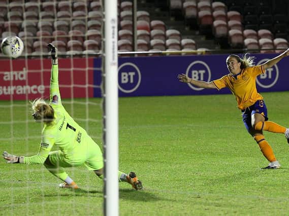 Everton's Simone Magill (right) scores her side's first goal of the game during the Vitality Women's FA Cup Semi Final match at SportNation.bet Stadium, Birmingham
