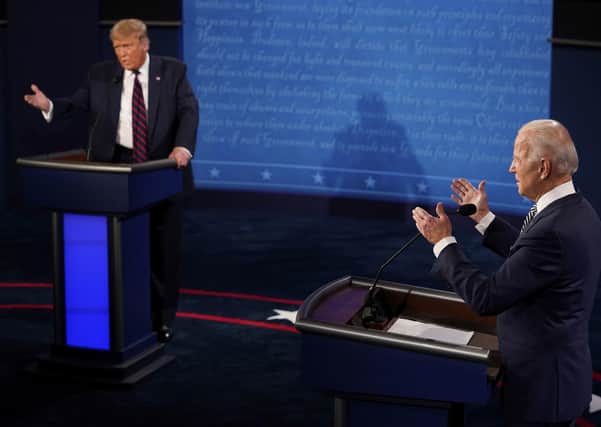 President Donald Trump and Democratic presidential candidate former Vice President Joe Biden exchange points during the fractious first presidential debate Tuesday, Sept. 29, 2020 in Cleveland, Ohio. (AP Photo/Morry Gash, Pool)