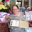 Clough Postmaster Norma Warnock who has received praise and an award for her outstanding customer service