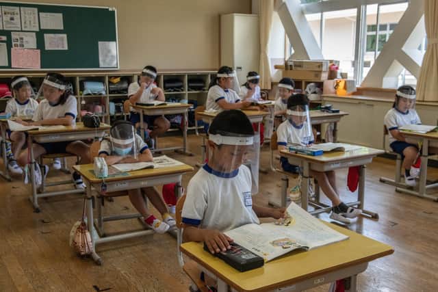 School children in Japan wearing visors as a precaution against Covid. Hugh McCarthy asks: 'Can learning take place in an atmosphere of anxiety?'