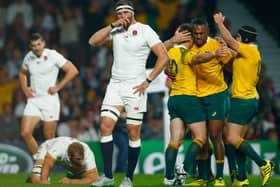 Chris Robshaw and Tom Wood (C) of England react as Bernard Foley of Australia celebrates scoring their first try with team mates during the 2015 Rugby World Cup Pool A match between England and Australia at Twickenham Stadium.  (Photo by Mike Hewitt/Getty Images).
