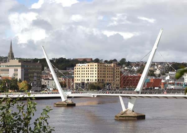 The Peace Bridge over the River Foyle in Derry. The Stormont Executive announced a wide-ranging series of restrictions for the Derry City and Strabane Council area on Thursday in an effort to stem the spiralling Covid-19 infection numbers in the north-west of Northern Ireland.