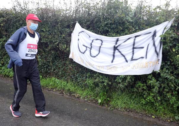 Ken Jones, 87, took part in the historic first virtual London Marathon during gale-force winds and rain in his home town of Strabane, west Tyrone