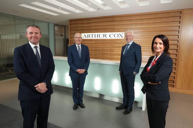 Catriona Gibson, Managing Partner of Arthur Cox in Belfast is joined by Arthur Cox Managing Partner Geoff Moore to mark the firm’s 100th anniversary. They are with Rowan White, Arthur Cox consultant and President of The Law Society of Northern Ireland, and Alan Taylor, the firm’s Chair in Northern Ireland