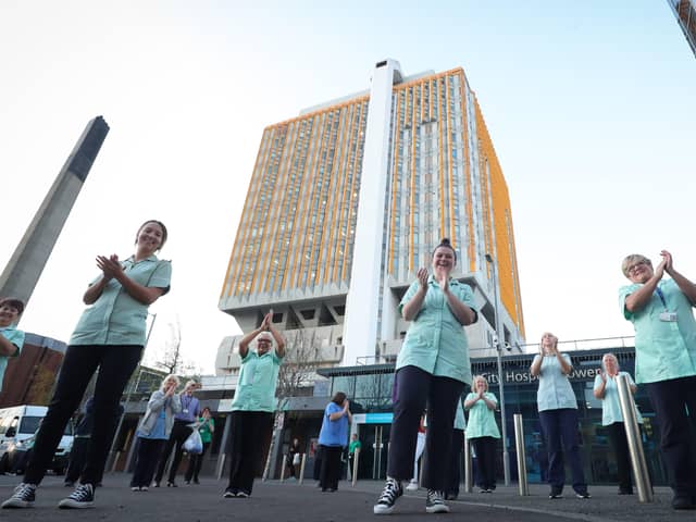 A clap for carers at the height of the pandemic at the tower block at Belfast City Hospital, which hosts a Nightingale facility