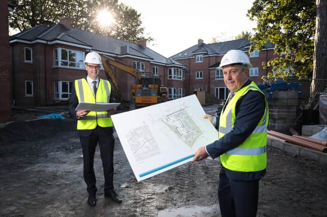 Dominic O’Neill from Danske Bank is pictured with Alpha Housing chairman John Clarke at the housing association’s Barnett’s Road scheme.  The development is an exemplar scheme of 14 two-bedroom apartments, built to the ‘HAPPI’ principles, the blueprint for high-quality housing for older people. The new homes are expected to be occupied by early 2021