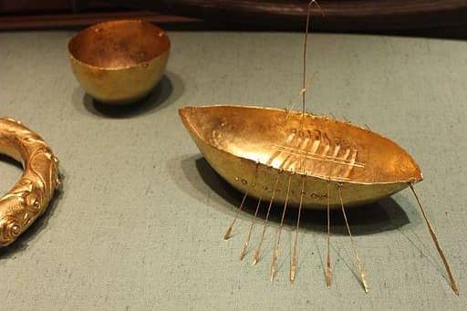 Gold boat, cup and bracelet, part of the Broighter hoard on display in Dublin's National Museum