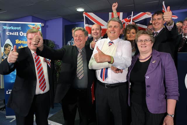 Press Eye - Belfast - Northern Ireland - 7th  May 2011 - North Ireland Assembly Election Count at Lisburn Leisure Centre - South Down Constituency - 

DUP member for South Down Jim Wells pictured with his wife Grace and other members of the DUP after being elected in Lisburn.

Picture by Kelvin Boyes / PressEye.com -