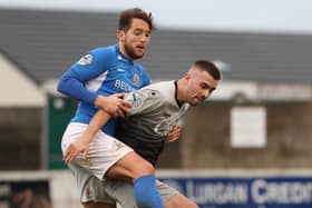 Glenavon’s Seamus Sharkey tussles with his now new Institute team-mate Alex Pomeroy, during their game last season. Picture by David Maginnis - Pacemaker Press