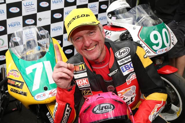 Davy Morgan celebrates his 250cc race victory at the Ulster Grand Prix in 2017.