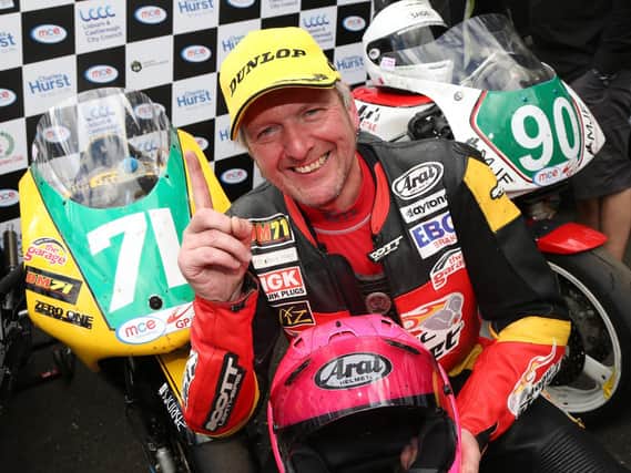 Davy Morgan celebrates his 250cc race victory at the Ulster Grand Prix in 2017.