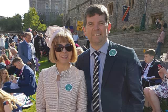 Adrian Petticrew with his partner Sharon Sherrard in the grounds of Windsor Castle for the wedding of Prince Harry and Meghan Markle in 2018