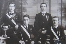 A shooting team from St Barnabas’s Church, Duncairn Gardens, Belfast, 1912. Right is James Baird, a bugler with the 15th Battalion Royal Irish Rifles, who was killed on December 22, 1915 while trying to rescue a wounded comrade. Picture: News Letter archives