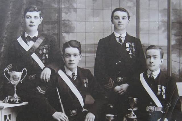 A shooting team from St Barnabas’s Church, Duncairn Gardens, Belfast, 1912. Right is James Baird, a bugler with the 15th Battalion Royal Irish Rifles, who was killed on December 22, 1915 while trying to rescue a wounded comrade. Picture: News Letter archives