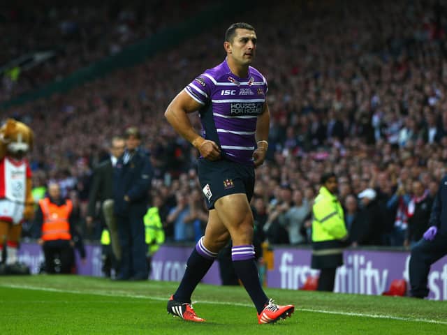 Wigan’s Ben Flower walks from the pitch after receiving a red card during the Super League Grand Final match between St Helens and Wigan Warriors in 2014.