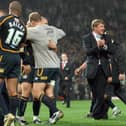 Leeds Rhinos head coach Tony Smith (centre) celebrates with his team after winning the Super League Grand Final at Old Trafford, Manchester in 2007.
