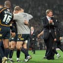 Leeds Rhinos head coach Tony Smith (centre) celebrates with his team after winning the Super League Grand Final at Old Trafford, Manchester in 2007.