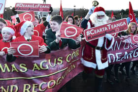 'Father Christmas' at Stormont in December 2019, with Irish langauge campaigners