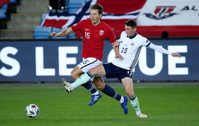 Norway's Sander Berge with Northern Ireland's Jordan Thompson during Wednesday night's UEFA Nations League game at the Ullevaal Stadium, Oslo.   Photo by William Cherry/Presseye