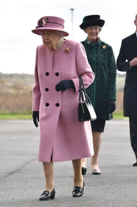 Queen Elizabeth II arrives for a visit to the Defence Science and Technology Laboratory (DSTL) at Porton Down, Wiltshire