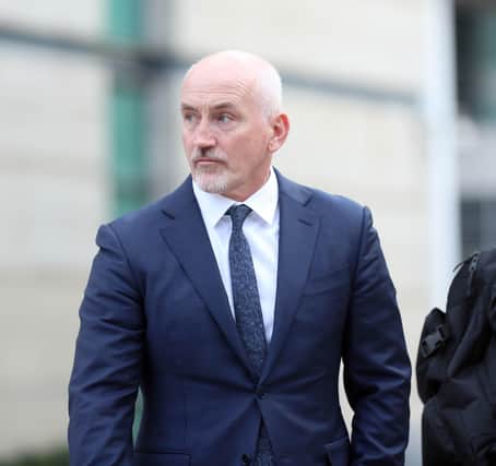 Barry McGuigan arrives at court