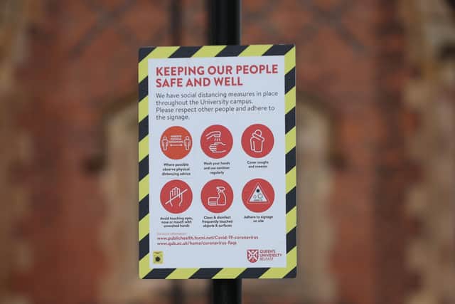 A sign outside Queen's University in Belfast. (Photo: PA Wire)