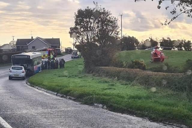 An image from the scene showing the school bus and the Northern Ireland Air Ambulance.
