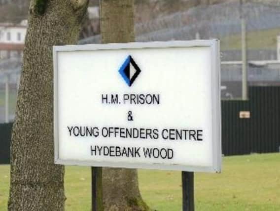 Four prison officers have tested positive at Hydebank