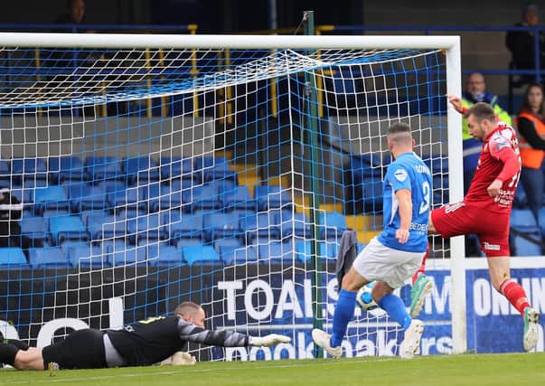 Stephen Murray nets the first goal of Portadown's Premiership return in the weekend win over Glenavon. Pic by Pacemaker.
