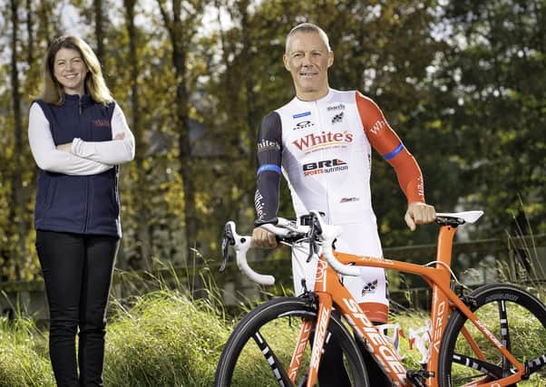 Endurance cyclist Joe Barr with Danielle McBride, brand manager at his sponsor White’s Oats