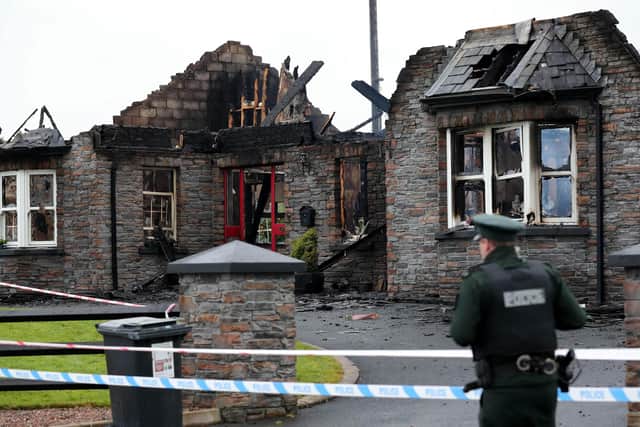 PSNI officers attend a house fire Annaghbeg Road, Dungannon. The blaze was reported to police shortly after 10:20pm on Monday night.

Police and other emergency services responded. Picture by Kelvin Boyes /PressEye