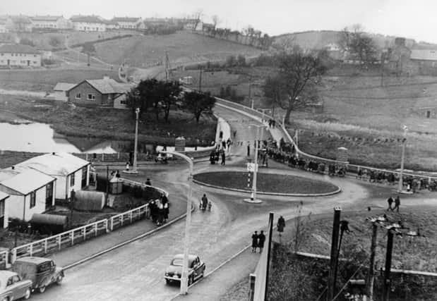 Opening of Johnston Bridge in 1954. Prefab houses and dardanelles on left, Cherry Island in middle beyond the roundabout. Photo FODC Museum Services