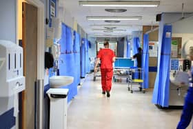 Hospitals are under increasing pressure as staff isolate due to Covid concerns