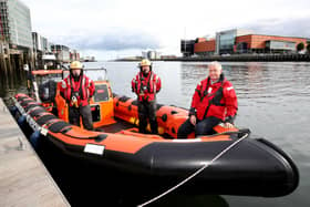 Lagan Search & Rescue crew Ronnie Ogilby and Noel Keenan with Belfast Harbour Chairman David Dobbin