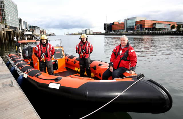 Lagan Search & Rescue crew Ronnie Ogilby and Noel Keenan with Belfast Harbour Chairman David Dobbin