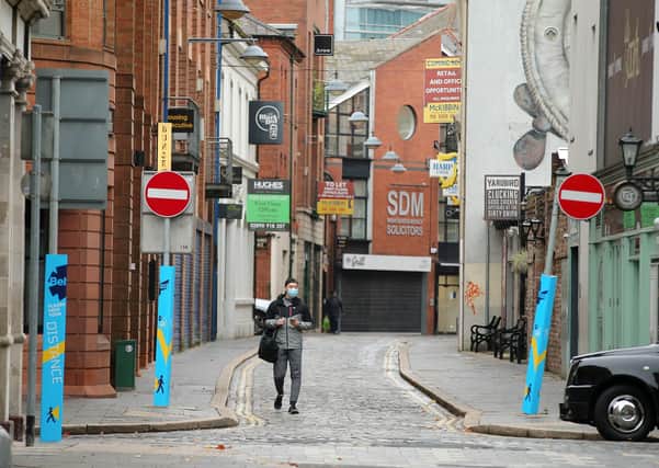Press Eye - Belfast - Northern Ireland - 19th October 2020  Northern Ireland begins four weeks of lockdown to try and stop the rise in number of COVID-19 cases.  Hospitality and other businesses are closed for a number of weeks with retail remaining open.  Schools are also shut for two weeks.   General view of Hill Street in Belfast City Centre.   Picture by Jonathan Porter/PressEye