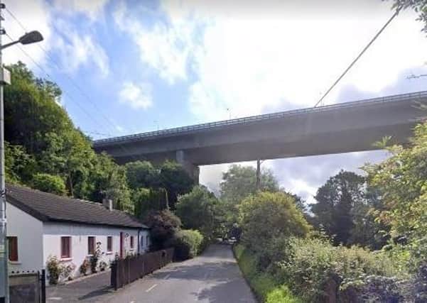 The body of a woman was discovered on Lower Road near the M50 Toll Plaza bridge (pictured above). (Photo: Google Street View)