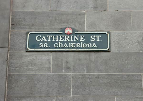 A street sign in English and Irish