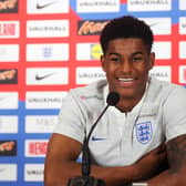 Manchester United footballer Marcus Rashford has been campaigning for free school meal provision in England,. He is pictured here during a media appearance with the England national team. Pic: PA