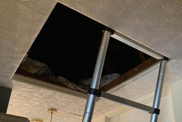 The man was discovered hiding from police in this roof space. (Photo: PSNI)