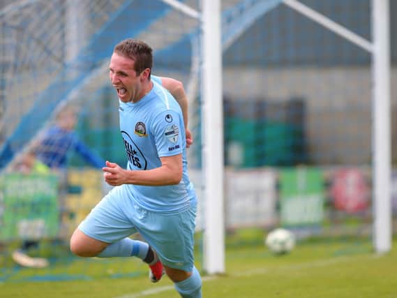 Alan O'Sullivan came off the bench to score for Warrenpoint before having to go off injured late on